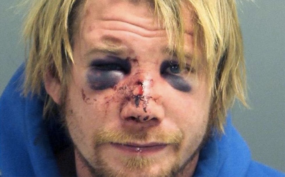 Police say he kicked down ex-girlfriend's door — and was faced with painful surprise