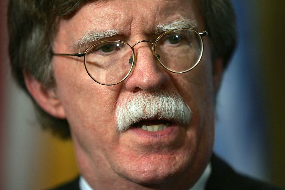 John Bolton splits with Trump on retaliation for Russian hacking