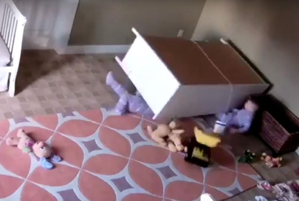 Watch terrifying moment dresser falls on 2-year-old boy — and what his twin does to rescue him