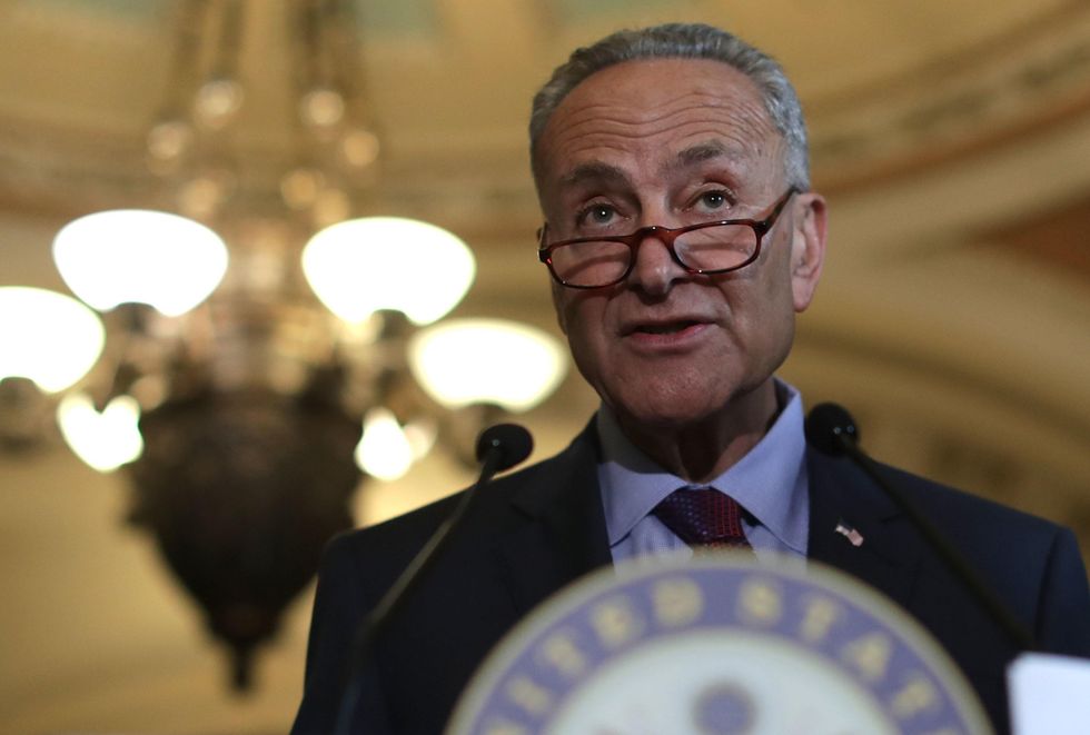 Top Senate Democrat blasts 'really dumb' Trump for challenging intel. community on Russia