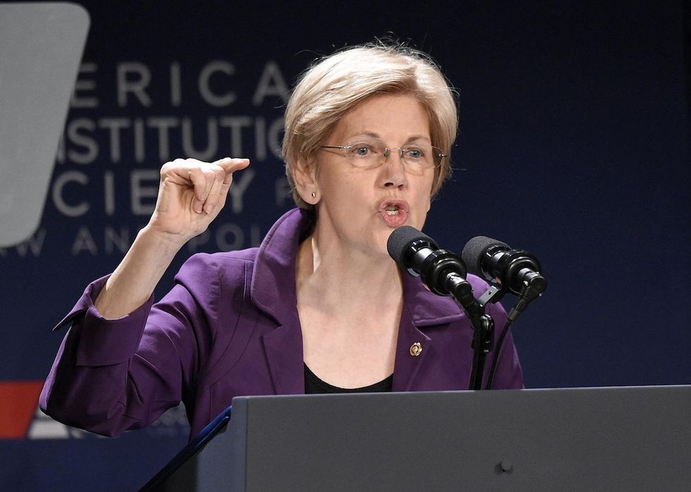 Elizabeth Warren says she'll run for re-election — to fight Trump more