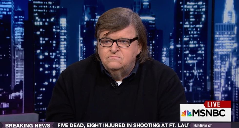 Michael Moore calls for '100 days of protest' against Donald Trump