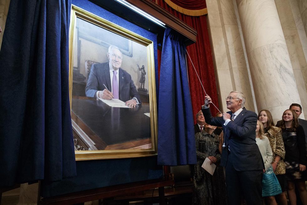 Harry Reid spent thousands of dollars in campaign funds on a picture of himself
