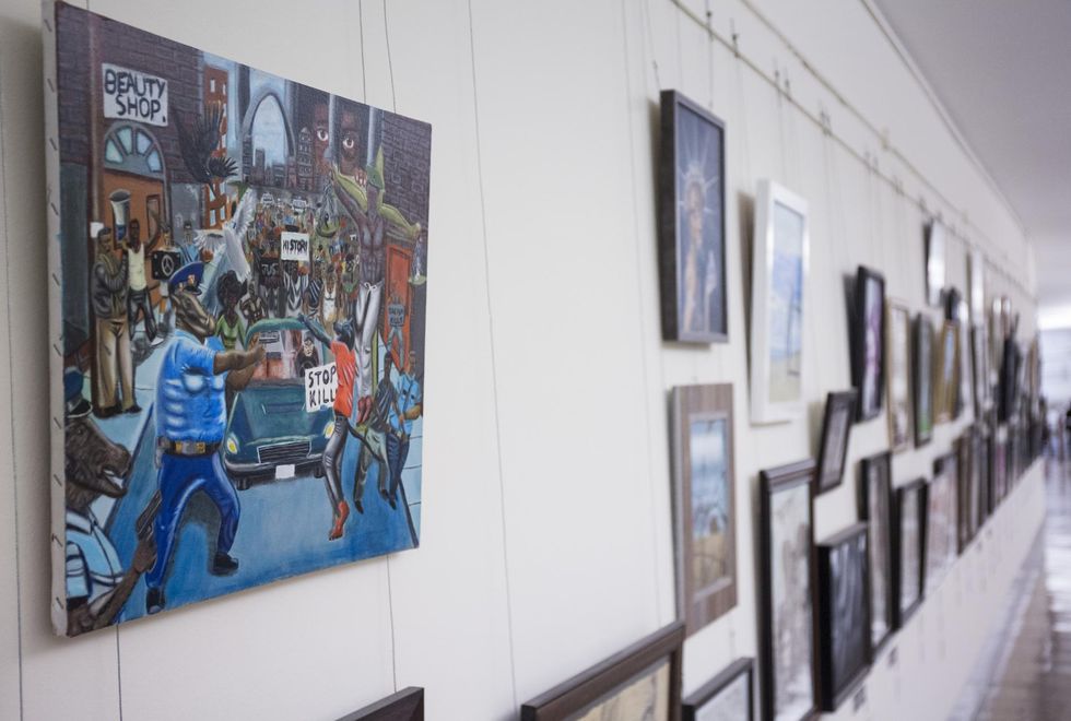 Democrat demands Republican be charged with theft of controversial painting of cop as a pig