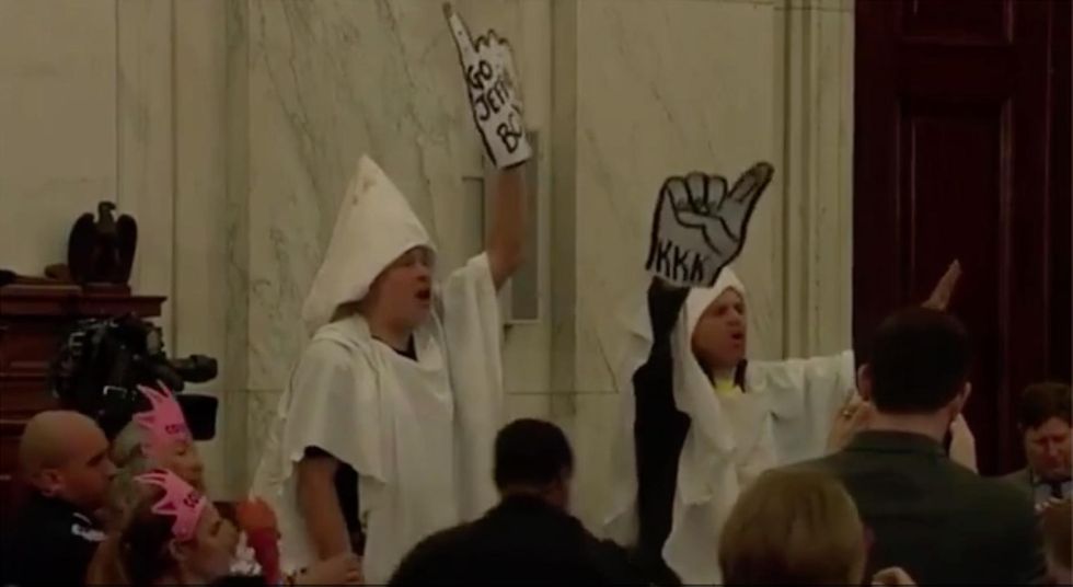 Watch: Code Pink protesters dressed as KKK members tossed from Sessions confirmation hearing