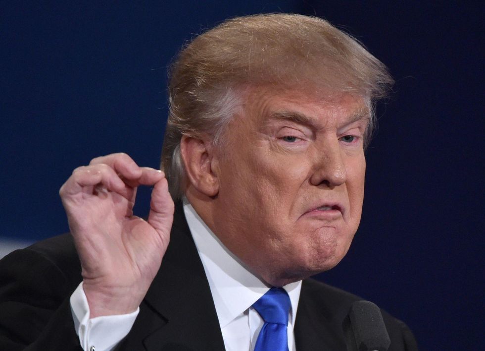 Trump continues assault on dossier report with morning tweetstorm