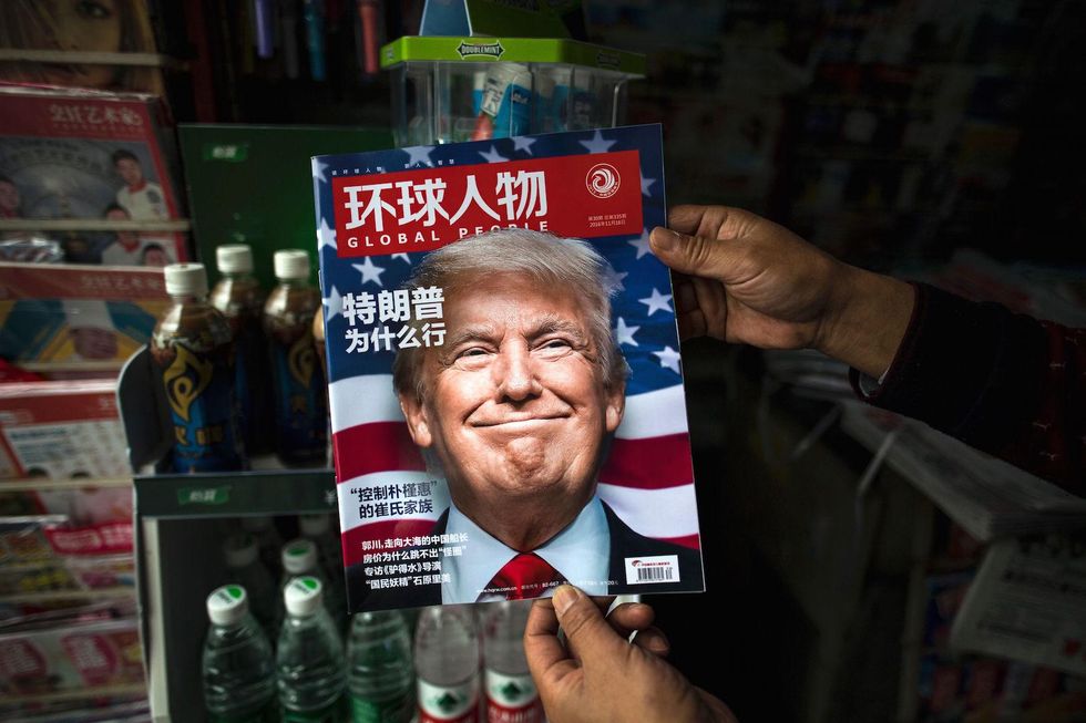 Beijing threatens to 'take off the gloves' over Trump's approach to China