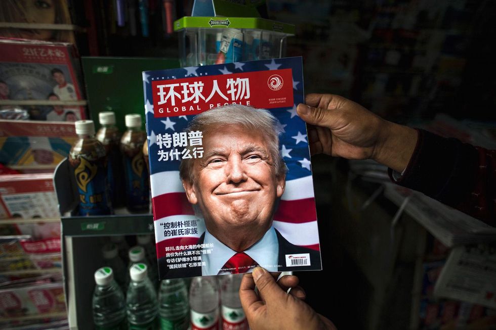 Beijing threatens to 'take off the gloves' over Trump's approach to China