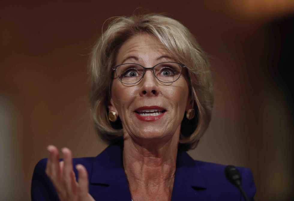 Watch: Trump education nominee gives Bernie Sanders an economics lesson during confirmation hearing