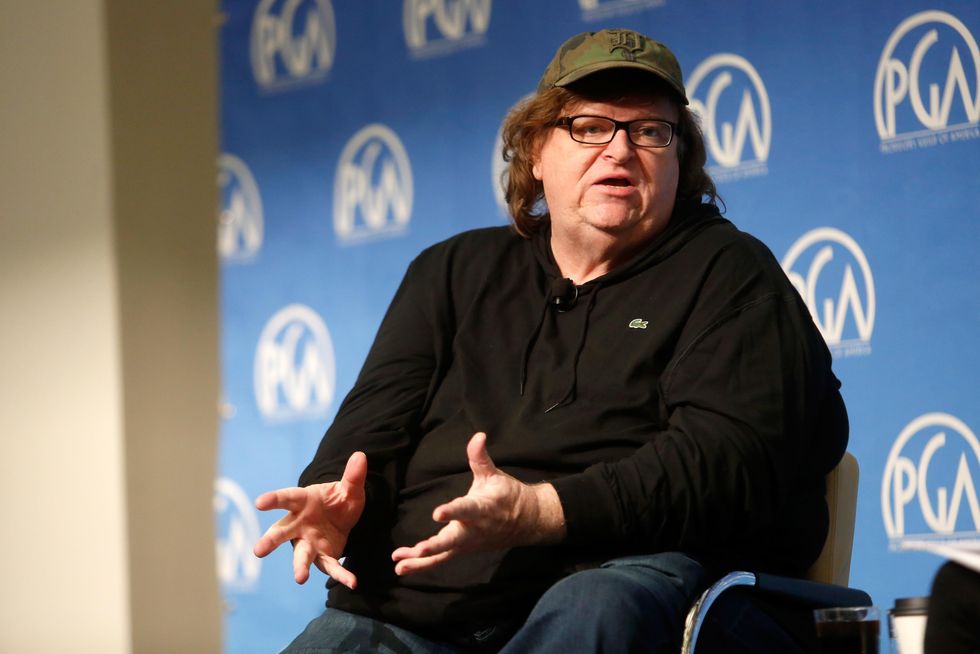 Filmmaker Michael Moore: Trump will 'absolutely' ban Muslims and build a wall