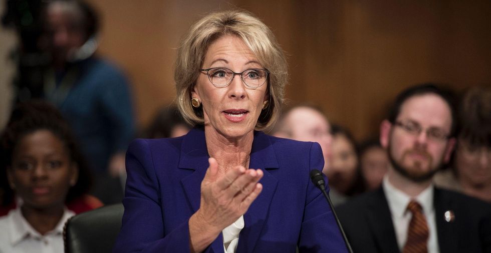 Trump’s education secretary pick says some schools might need guns — for a surprising reason