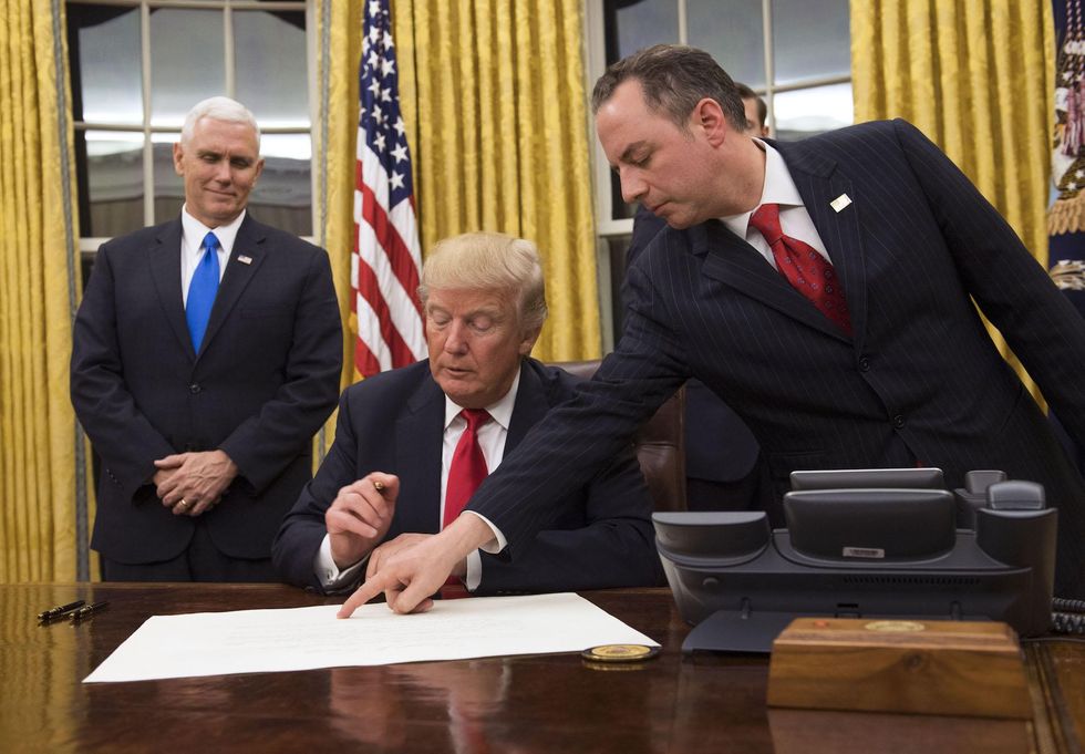 Trump signs his first executive order and it's directed against Obamacare