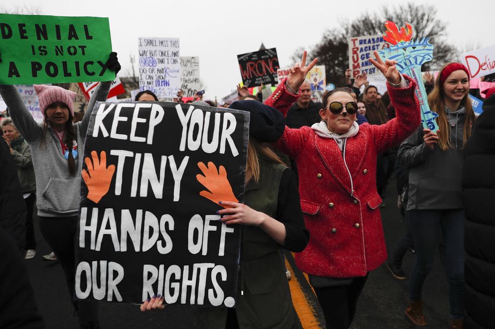 Hundreds of thousands of women descend on D.C. to protest against President Donald Trump