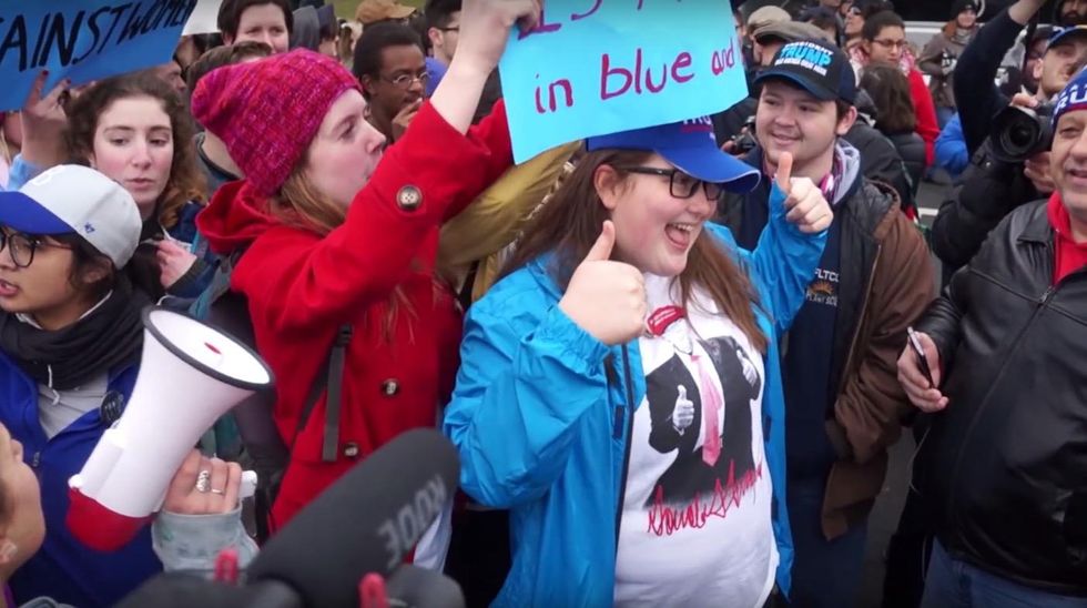 Caught on video: Female Trump supporter's hair set on fire at DC inauguration protest