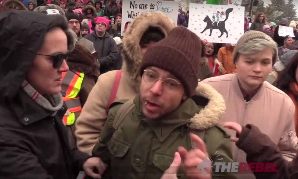 That liberal male who got violent with female reporter at Women's March? He got charged with assault