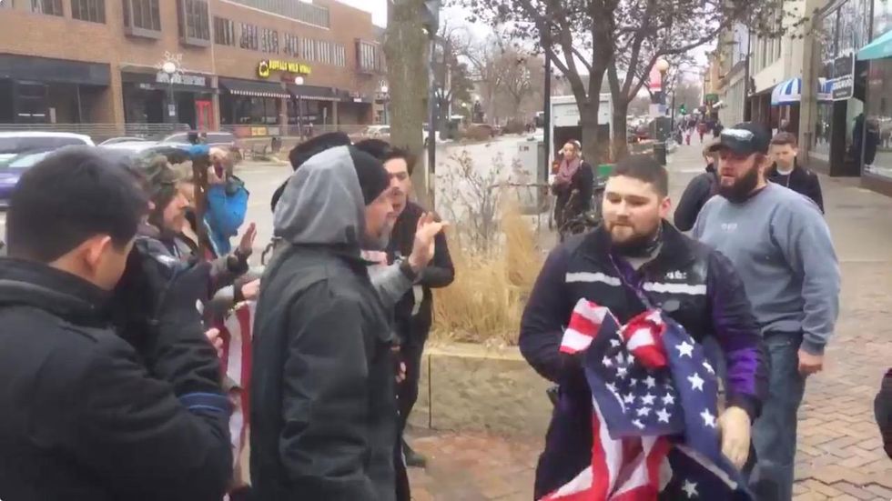 Iowa FedEx driver steps in to stop protesters from burning US flag