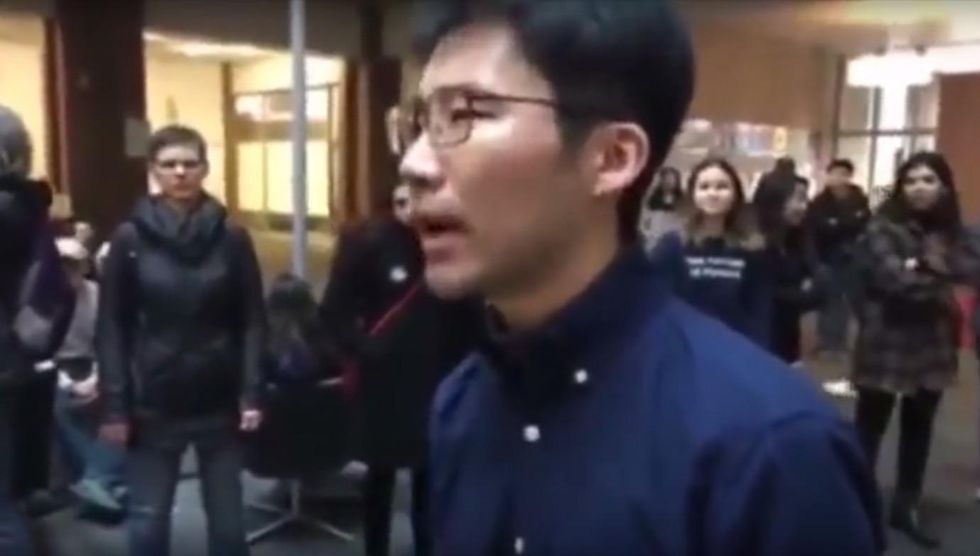 Watch one guy shut down chanting protesters in college library just after Trump inaugural address