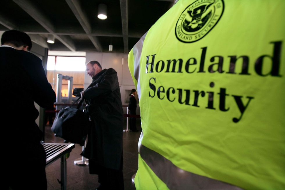 Department of Homeland Security announces it will no longer implement Trump's travel ban