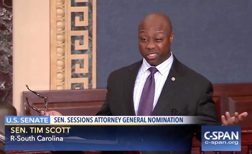Tim Scott reads bigoted insults tweeted to him for supporting Sessions nomination