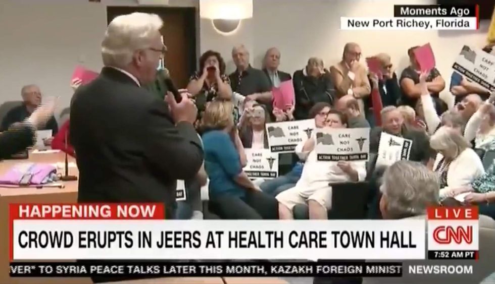 OK children!': Florida GOP exec mocks rowdy protesters during town hall after they jeer and boo him