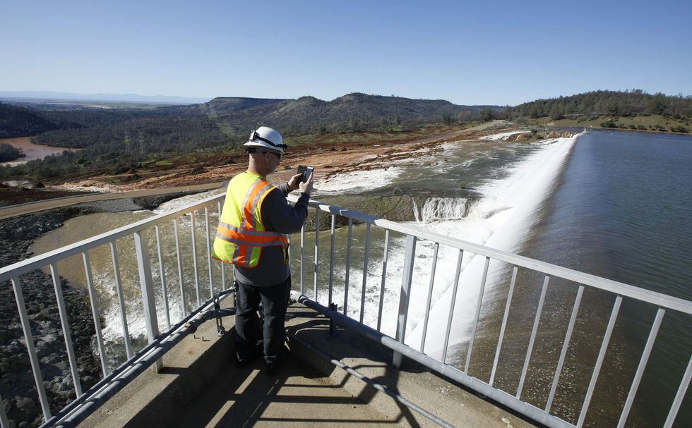 Officials in central California order emergency evacuations amid imminent collapse of large dam