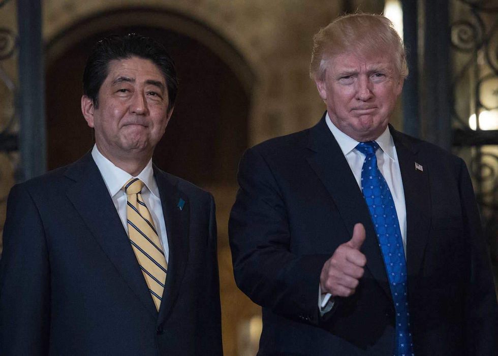 Trump, Abe discuss North Korean missile test in full public view at Mar-a-Lago