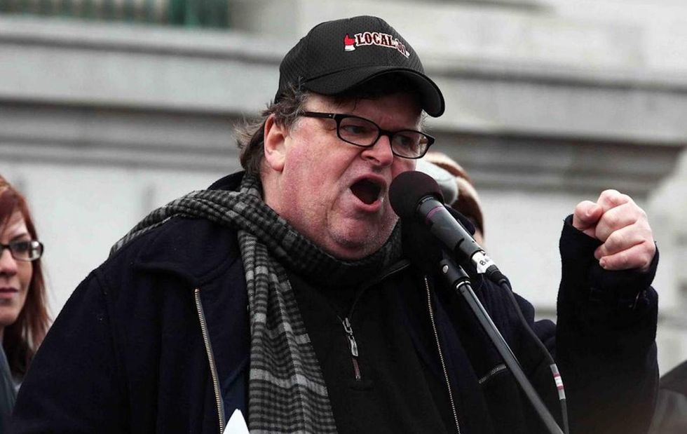 Michael Moore wants Trump to step down and Clinton named president