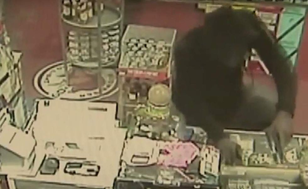 He shot first so I shot back': Armed robber pays dearly when liquor store clerk pulls his own gun