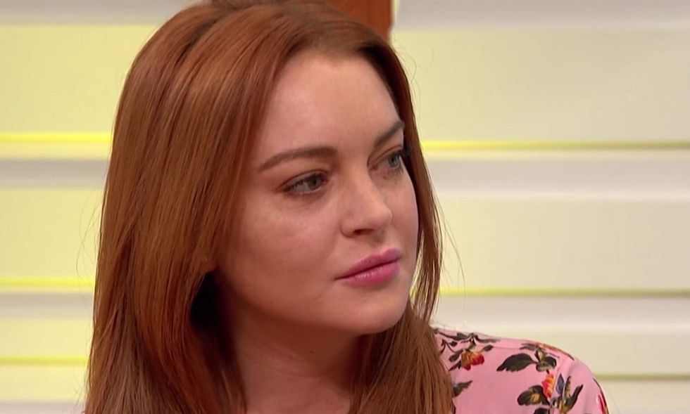 Lindsay Lohan says she was 'double-checked' at airport for wearing a headscarf