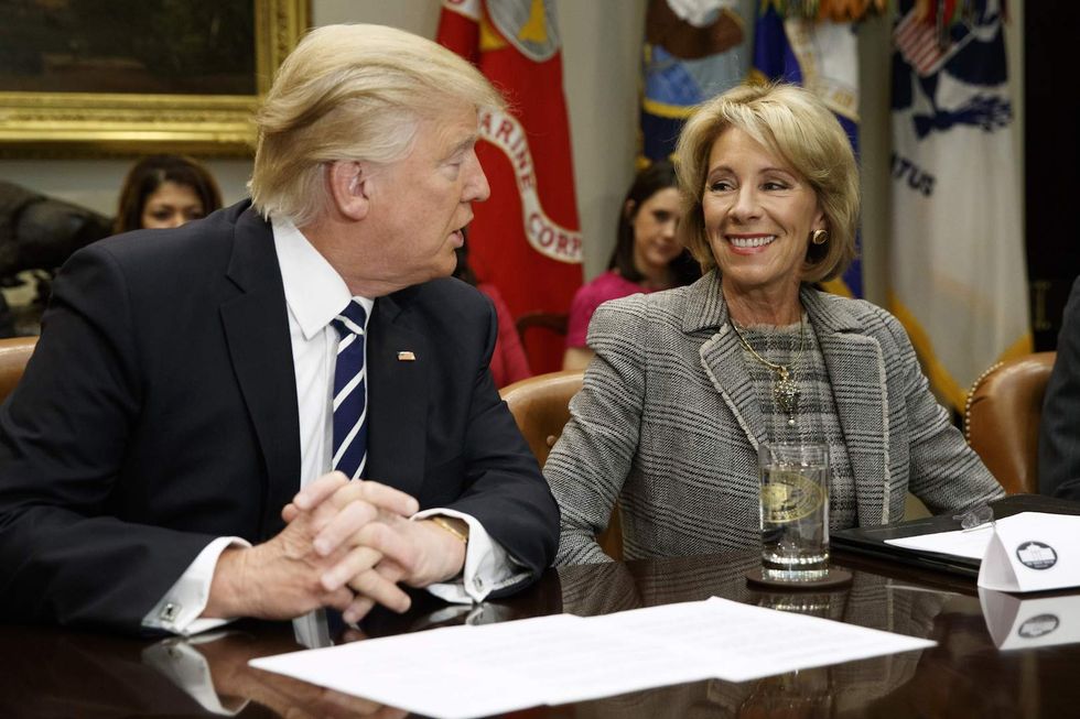 Is Education Secretary Betsy DeVos fully on board with new transgender bathroom rules?