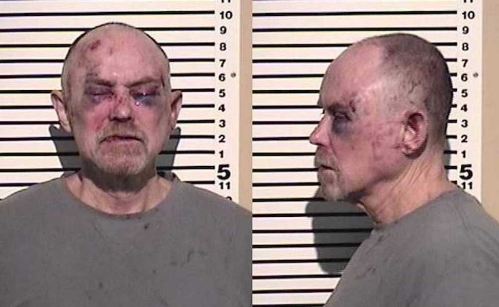 He's kicked out of bar then comes back in and points rifle. But patrons are having none of it.