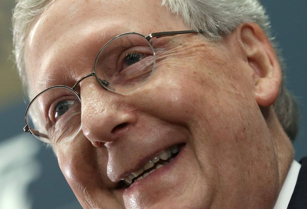 Feminists are tattooing Mitch McConnell's words on their bodies to protest Trump