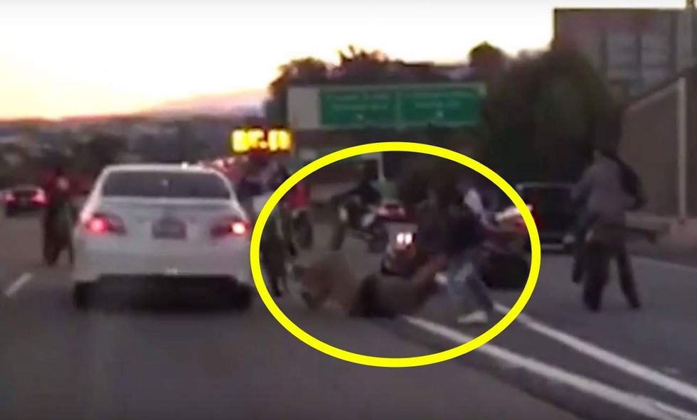 Reckless highway bikers caught on video beating up motorist after trapping him on roadside