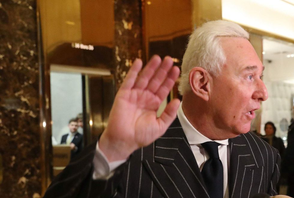 Former Trump adviser admits communications with hacker who broke into DNC files