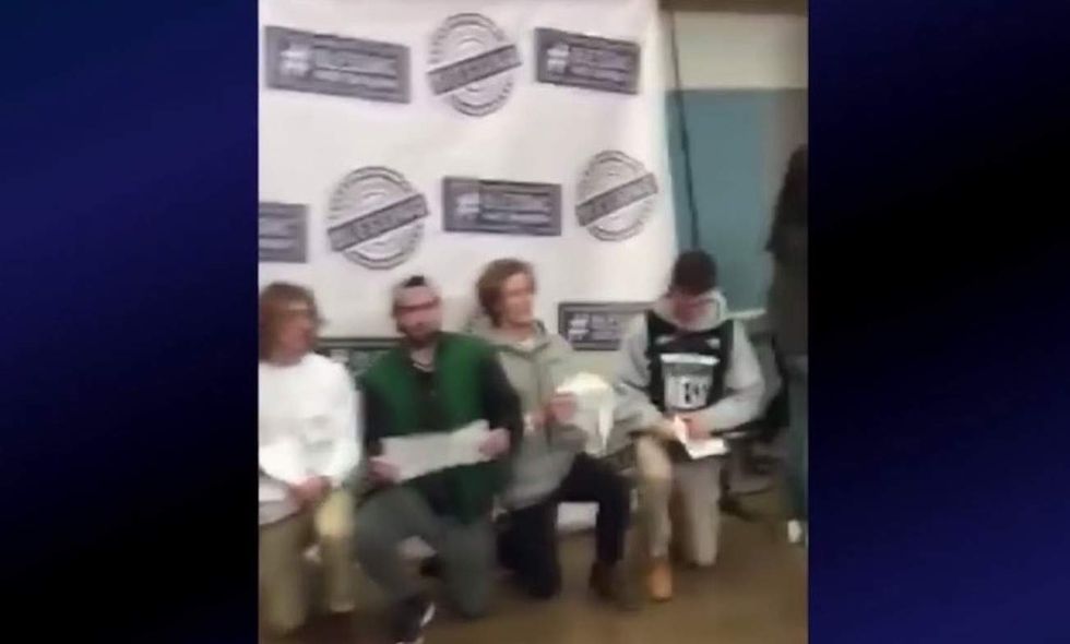 Christian high schoolers suspended after holding pro-Trump signs in front of pro-immigration banner