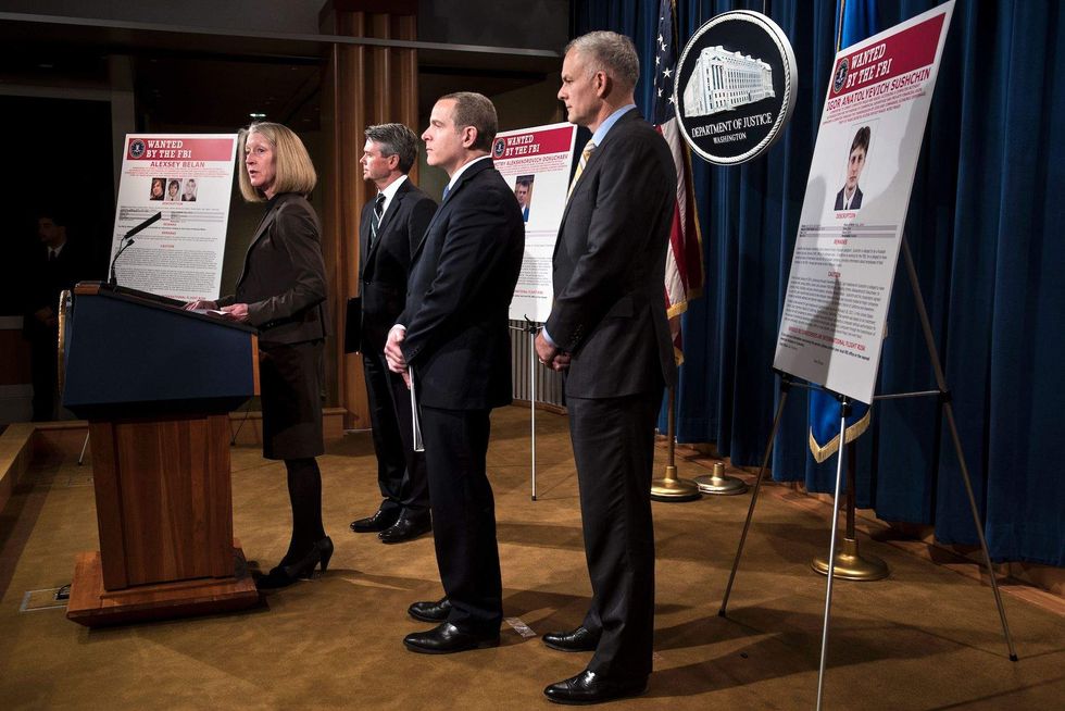 Justice Dept. charges Russian spies of hacking 500 million Yahoo accounts