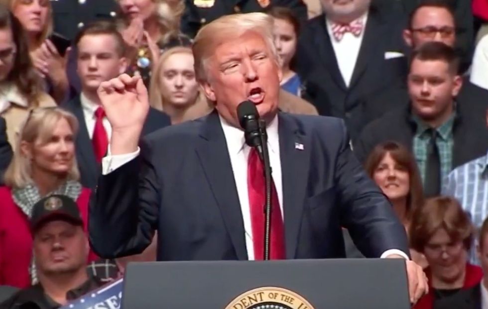 Trump bashes judge who placed restraining order on 2nd travel ban