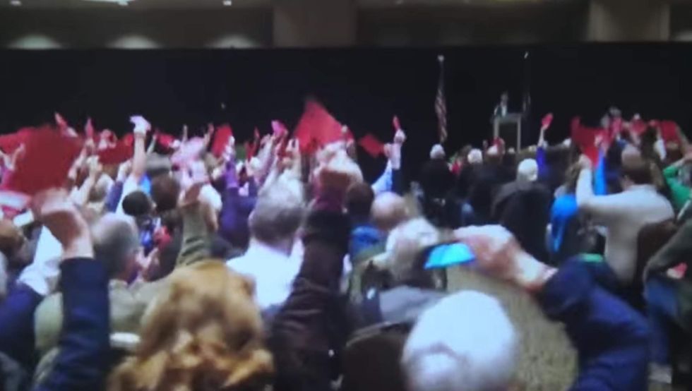 Watch: Liberal activists boo GOP congressman who voices support for military spending