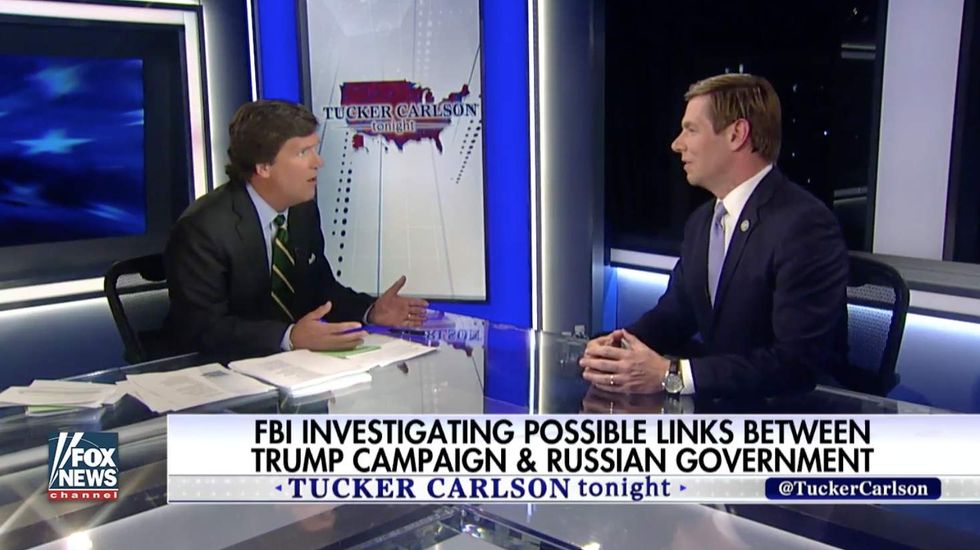 Tucker Carlson masterfully demolishes Dem who says Russia committed 'act of war' by hacking election