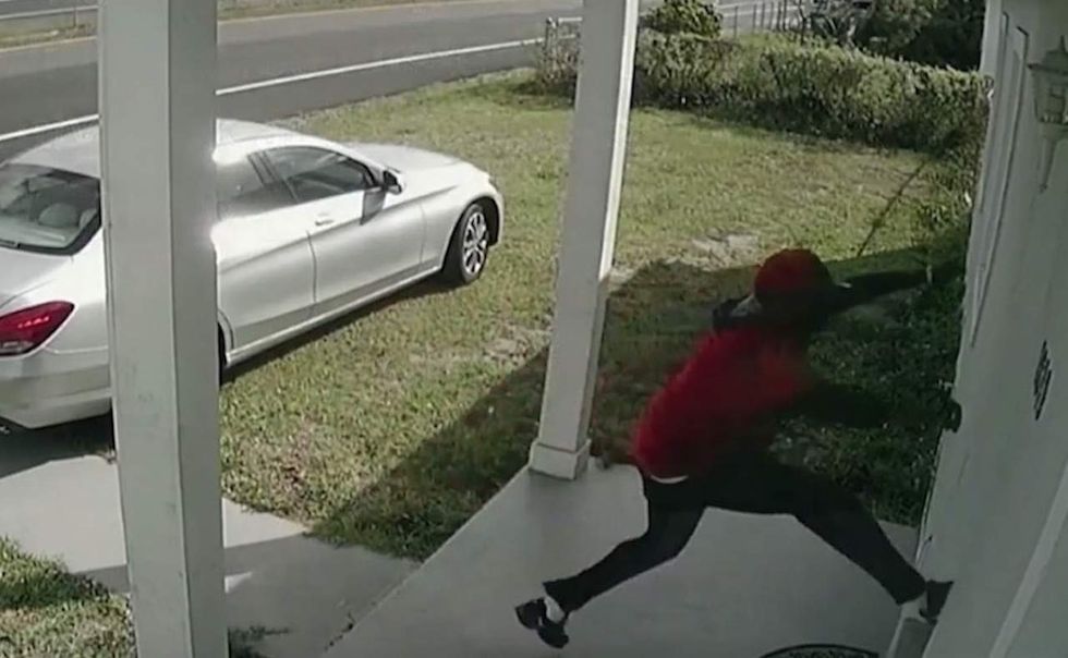 Creep kicks in door of home with mother and her two kids inside. Here's why he turned tail and ran.