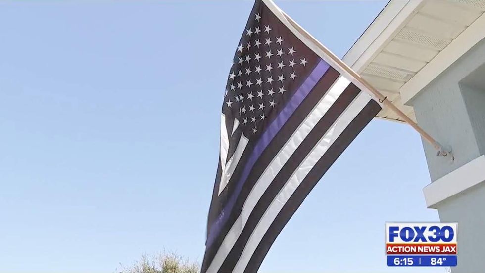 Florida woman forced to take down Blue Lives Matter flag after HOA makes outrageous claim