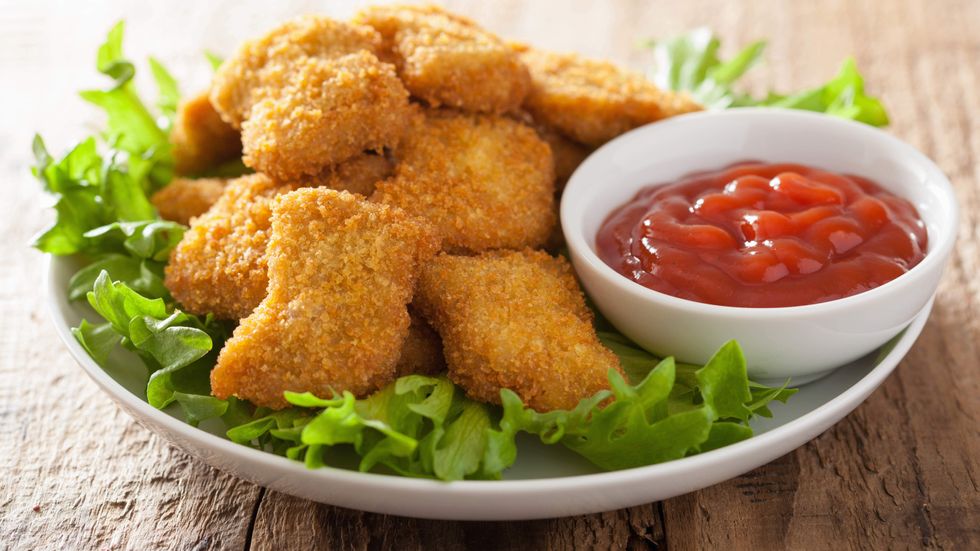 Jeffy Fisher won't let a few metal fragments keep him from eating chicken nuggets