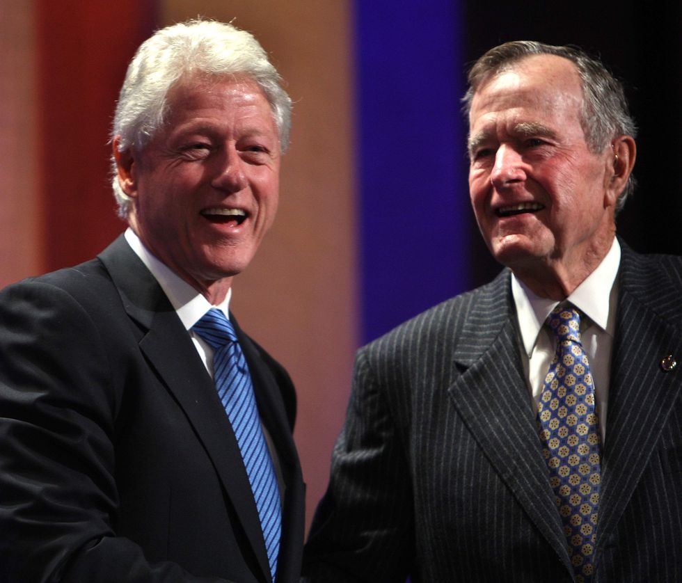 Can you guess what Bill Clinton gave to George H.W. Bush during his Houston visit?