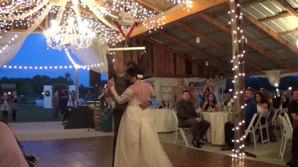 Watch how this paralyzed veteran surprises bride with a dance at their wedding