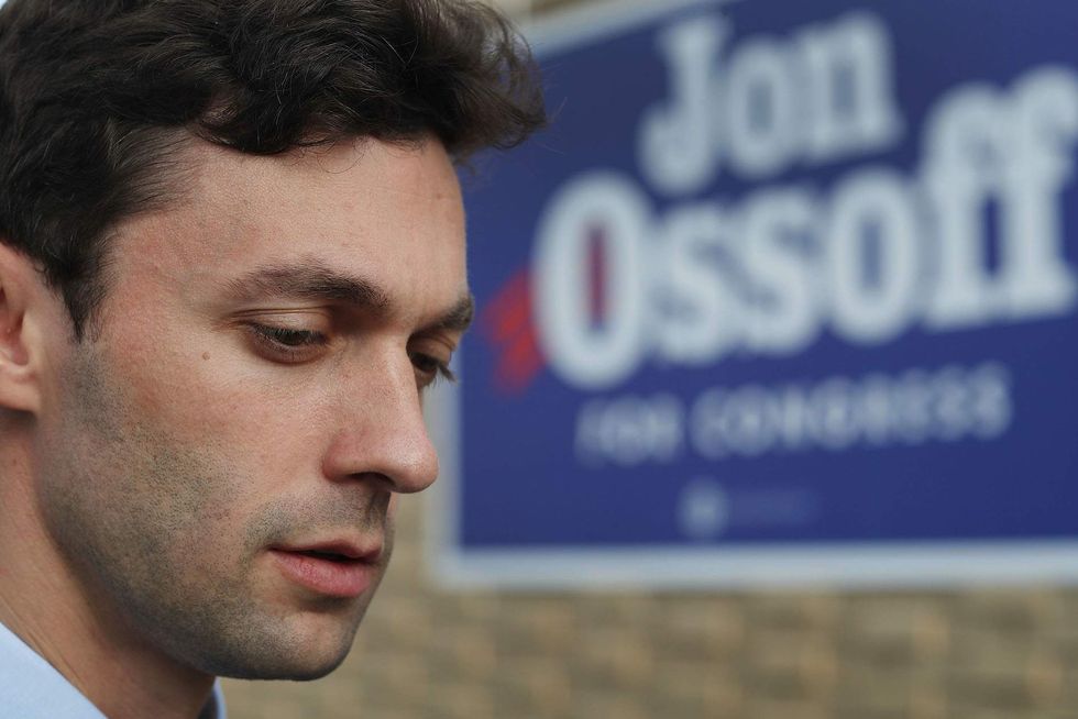Democrat fails to avoid run-off in Georgia election, Trump declares victory
