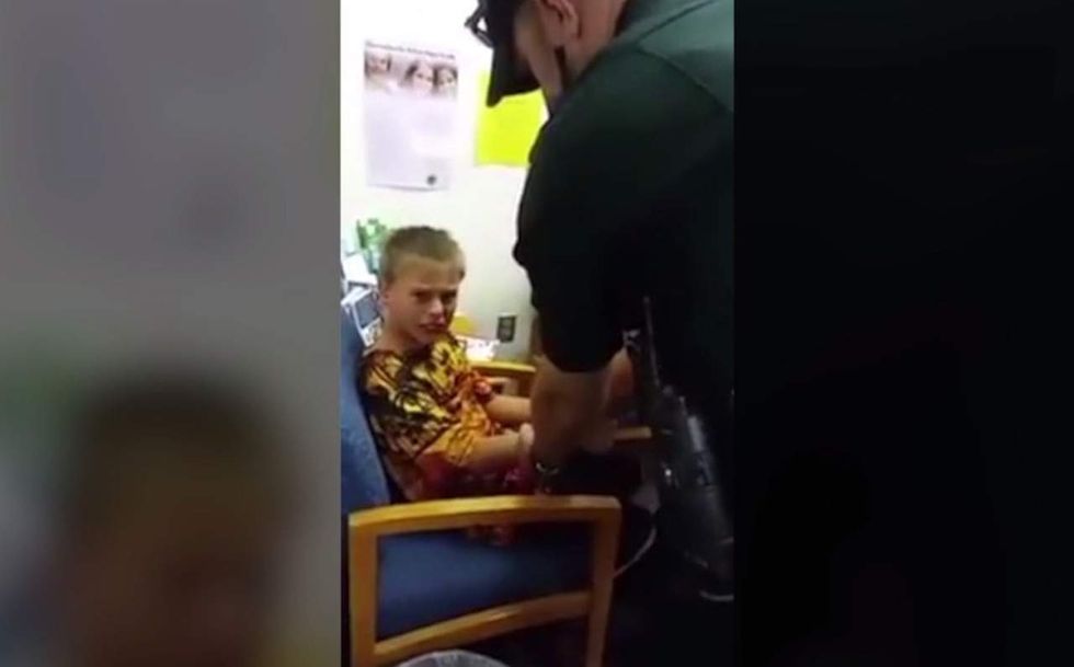10-year-old autistic boy handcuffed at school, spends night behind bars. Here's why.