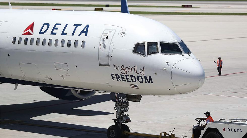 Watch: Delta Airlines pilot hits female passenger to break up wild fight