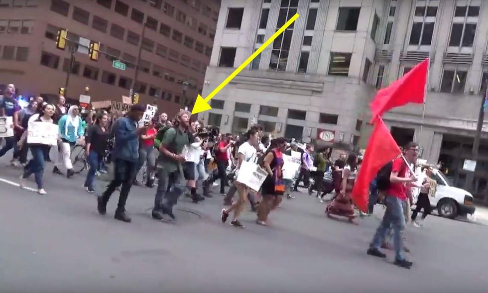 Kill Trump! Kill Pence!': May Day protester's chant caught on video, heard above marching crowd