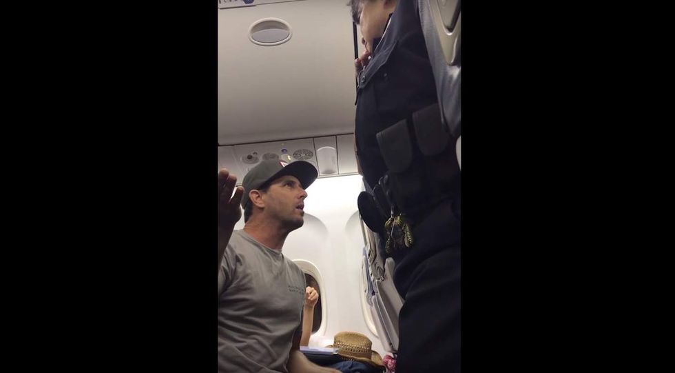 Delta apologizes to family kicked off flight; video shows jail threat made during seating dispute