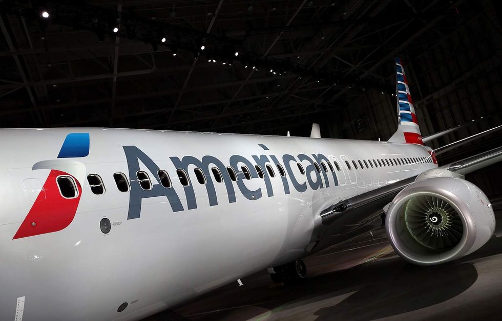 Man sues American Airlines after being forced to sit next to obese passengers on a flight